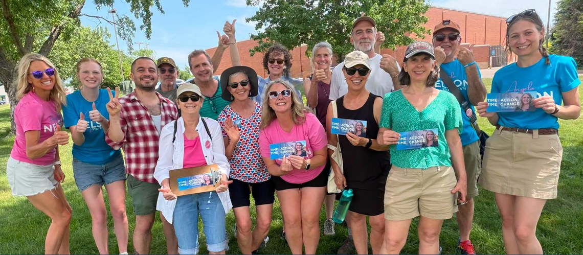 Ang Nelson with supporters at a community event